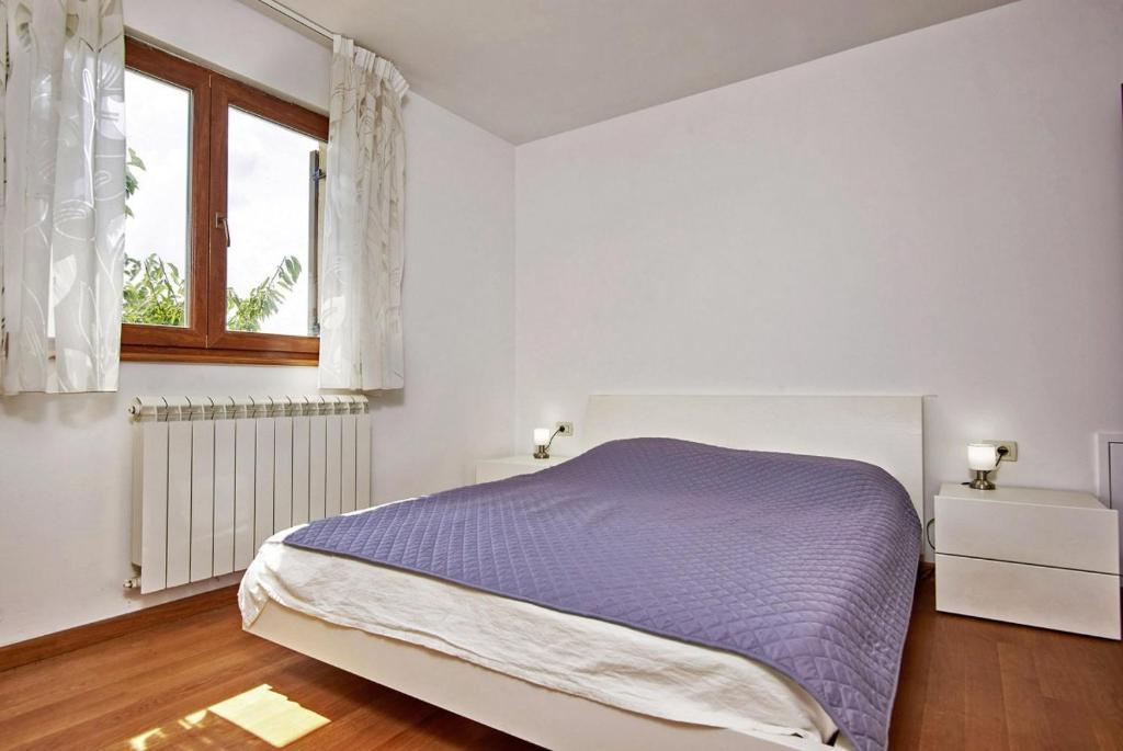 Posteľ alebo postele v izbe v ubytovaní Villa Theresa in Ližnjan (Haus für 12 Personen)