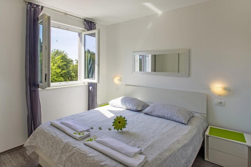 Posteľ alebo postele v izbe v ubytovaní Villa Mate in Kuhari - Haus für 8 Personen