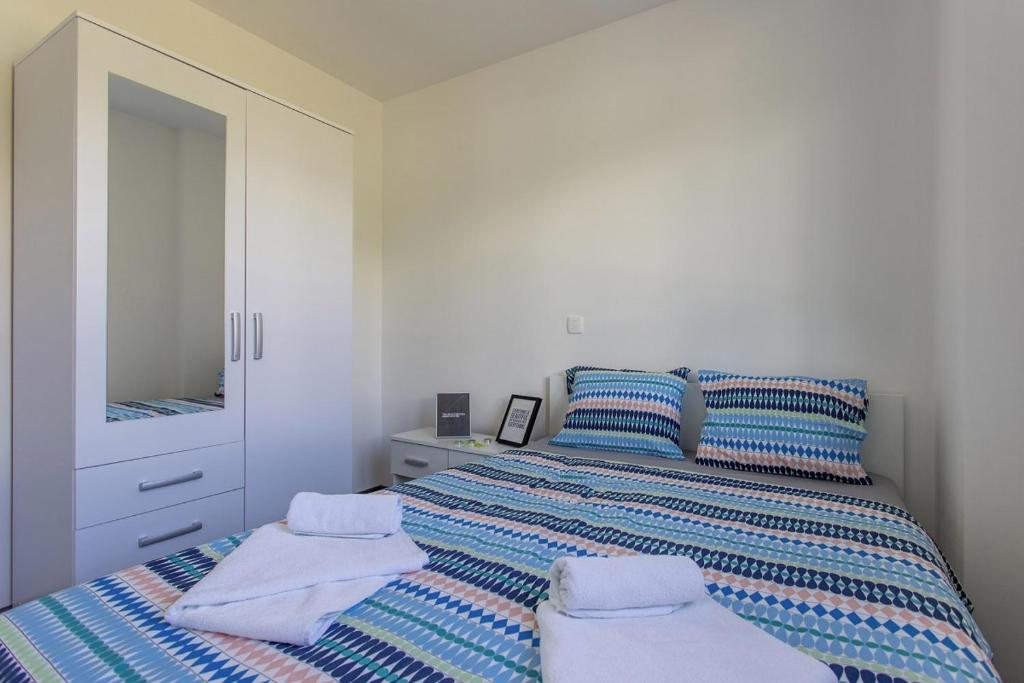 Posteľ alebo postele v izbe v ubytovaní Villa Mate in Kuhari - Haus für 8 Personen