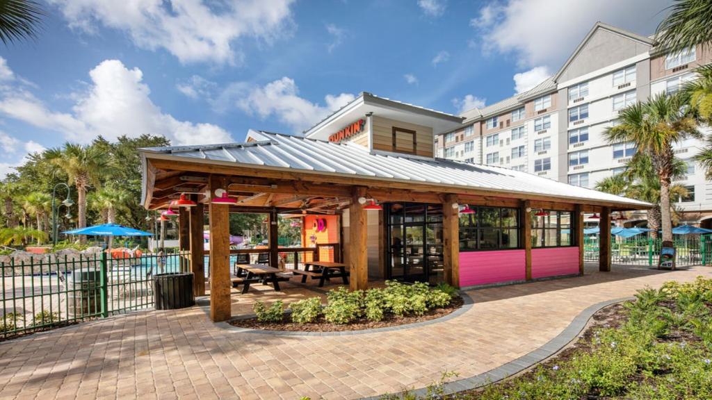 a gazebo in front of a hotel at Holiday Inn Express & Suites S Lake Buena Vista by IHG in Kissimmee