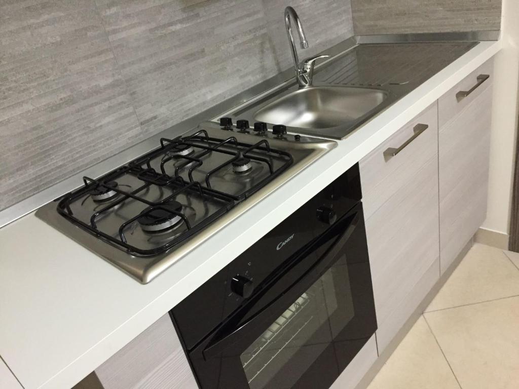 Kuchnia lub aneks kuchenny w obiekcie Apartments Casa Vacanze Dante