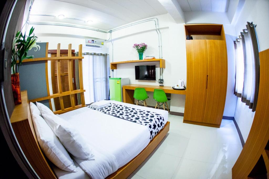 Postel nebo postele na pokoji v ubytování Euanjitt Chill House