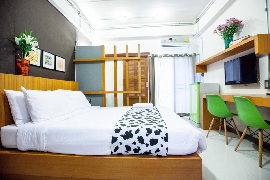Postel nebo postele na pokoji v ubytování Euanjitt Chill House