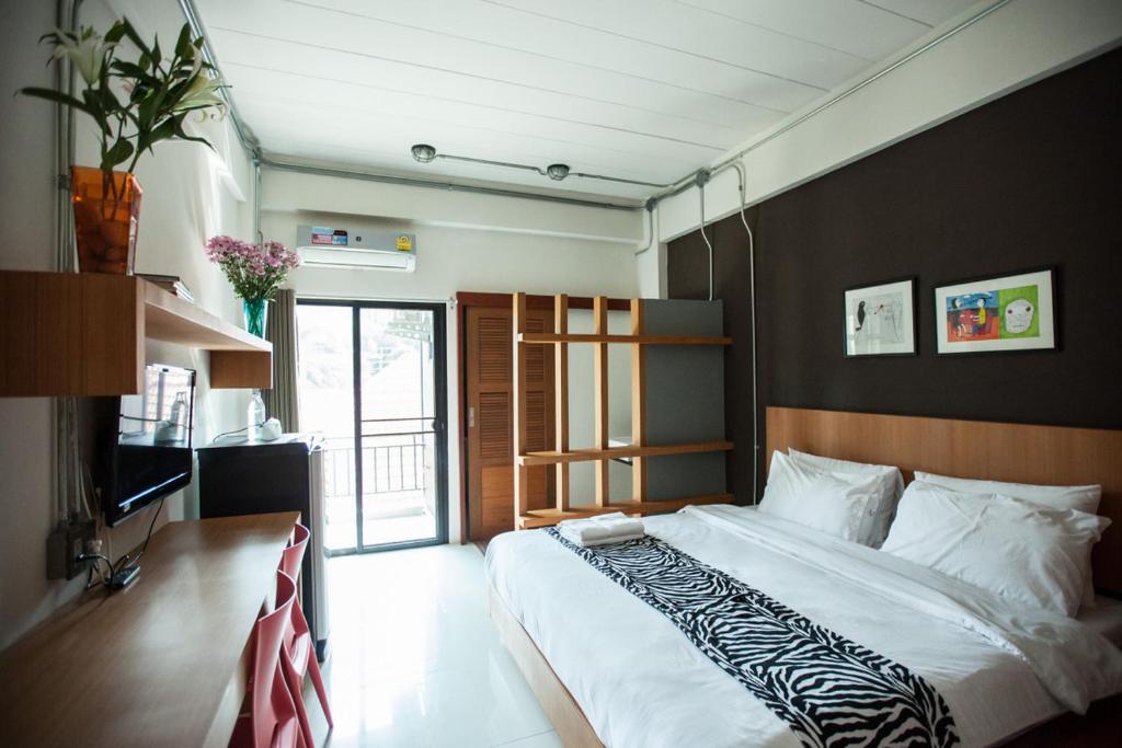 Postel nebo postele na pokoji v ubytování Euanjitt Chill House