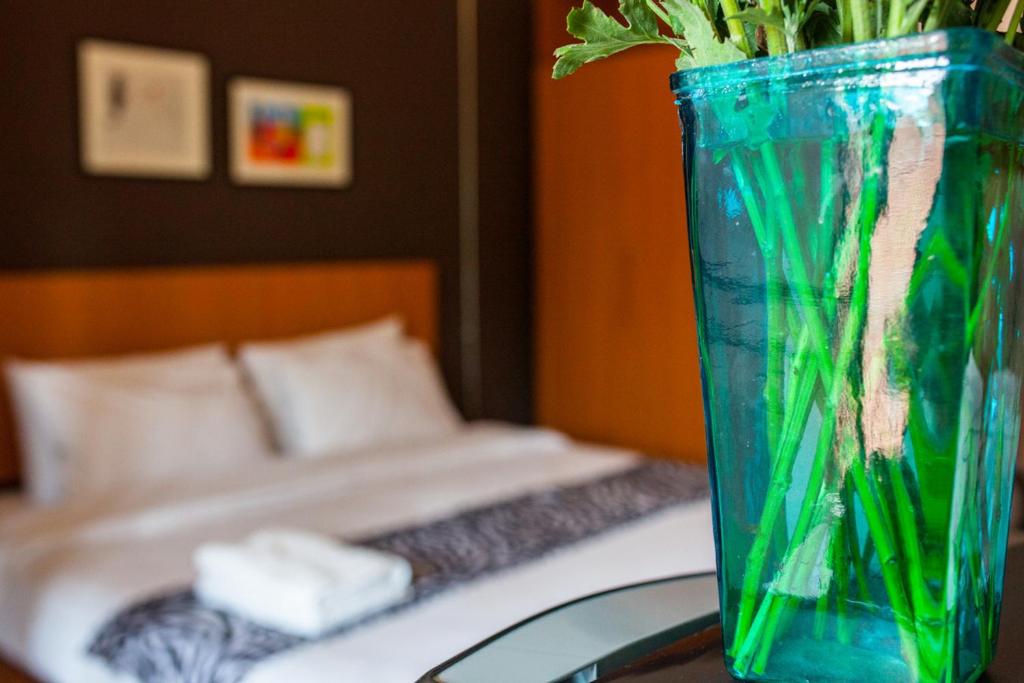 Postel nebo postele na pokoji v ubytování Euanjitt Chill House