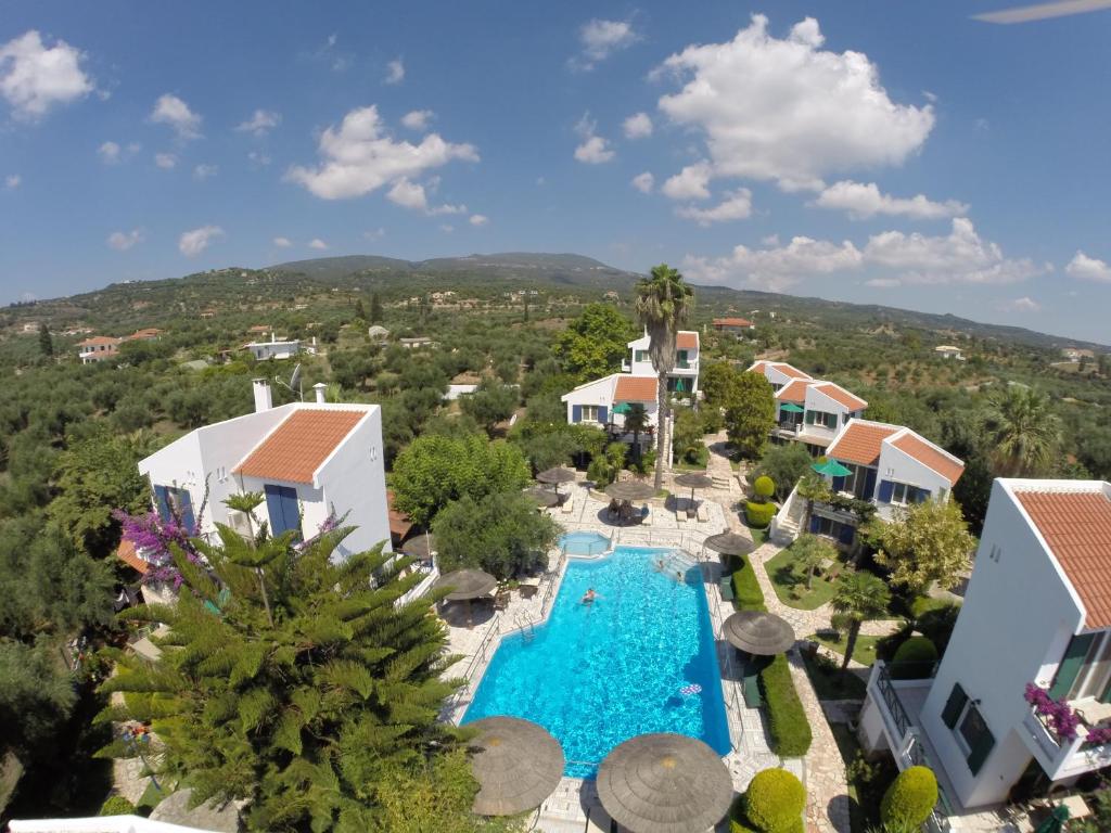 an aerial view of a resort with a swimming pool at Paris Village Apartments in Chrani