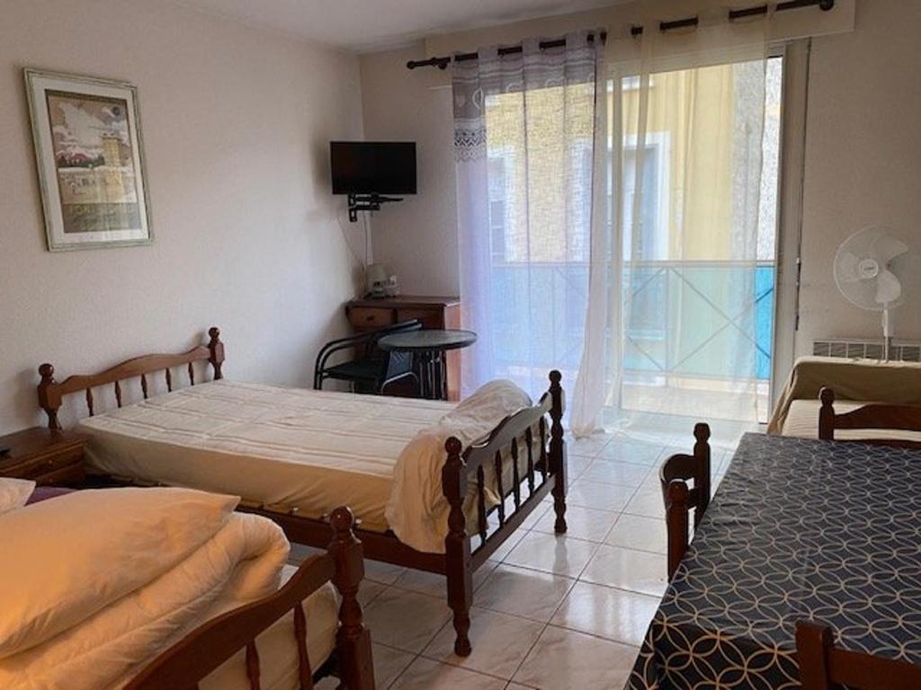 Posteľ alebo postele v izbe v ubytovaní Studio cosy avec parking à 50m des Thermes, 2 couchages - Amélie-les-Bains - FR-1-703-55