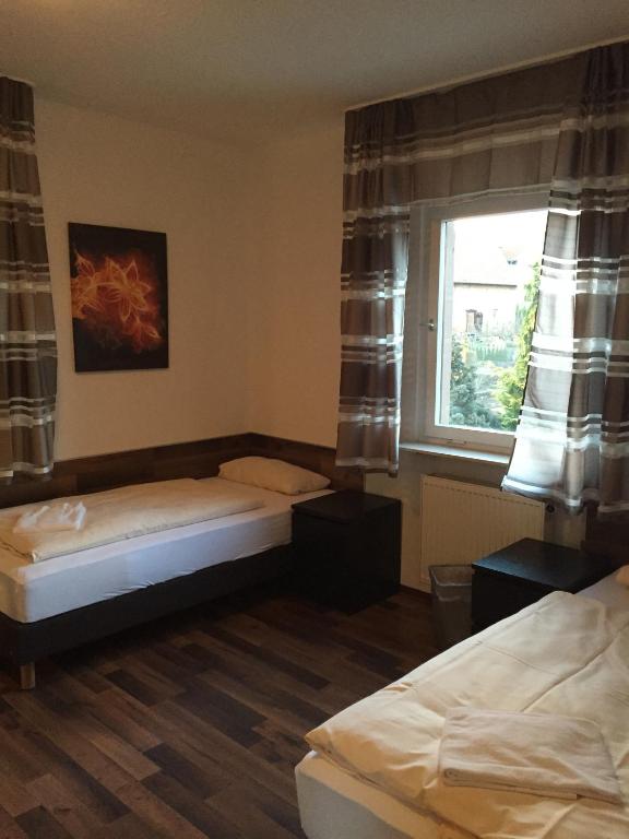 Postel nebo postele na pokoji v ubytování Hotel Engel