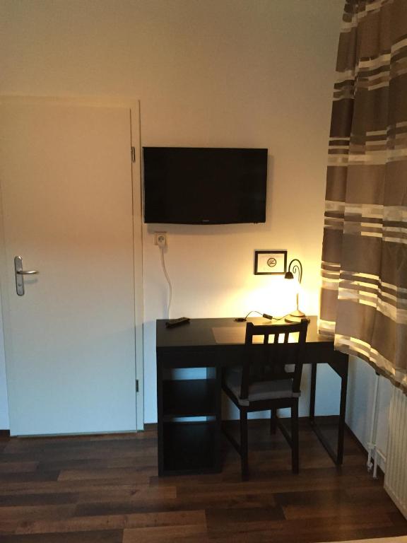 TV a/nebo společenská místnost v ubytování Hotel Engel