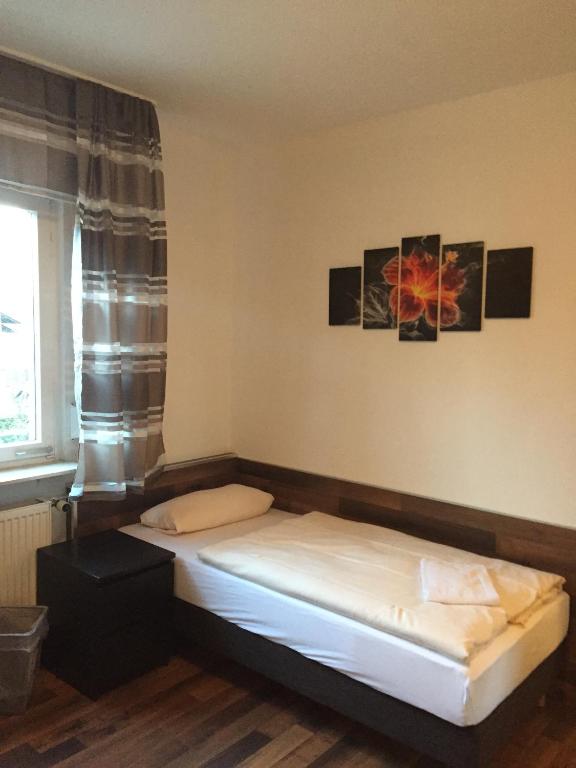 Postel nebo postele na pokoji v ubytování Hotel Engel
