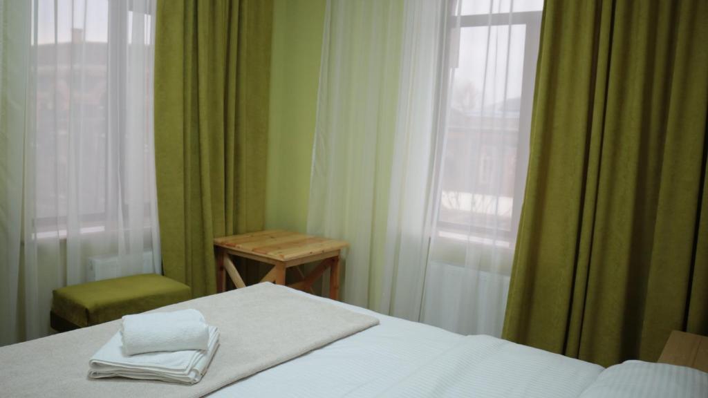 Postel nebo postele na pokoji v ubytování 21 Rooms Hotel