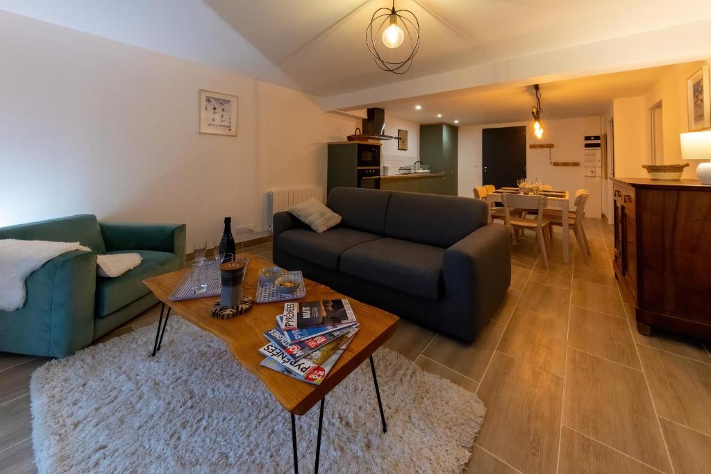 Kuchyňa alebo kuchynka v ubytovaní Les appartements de Clélia