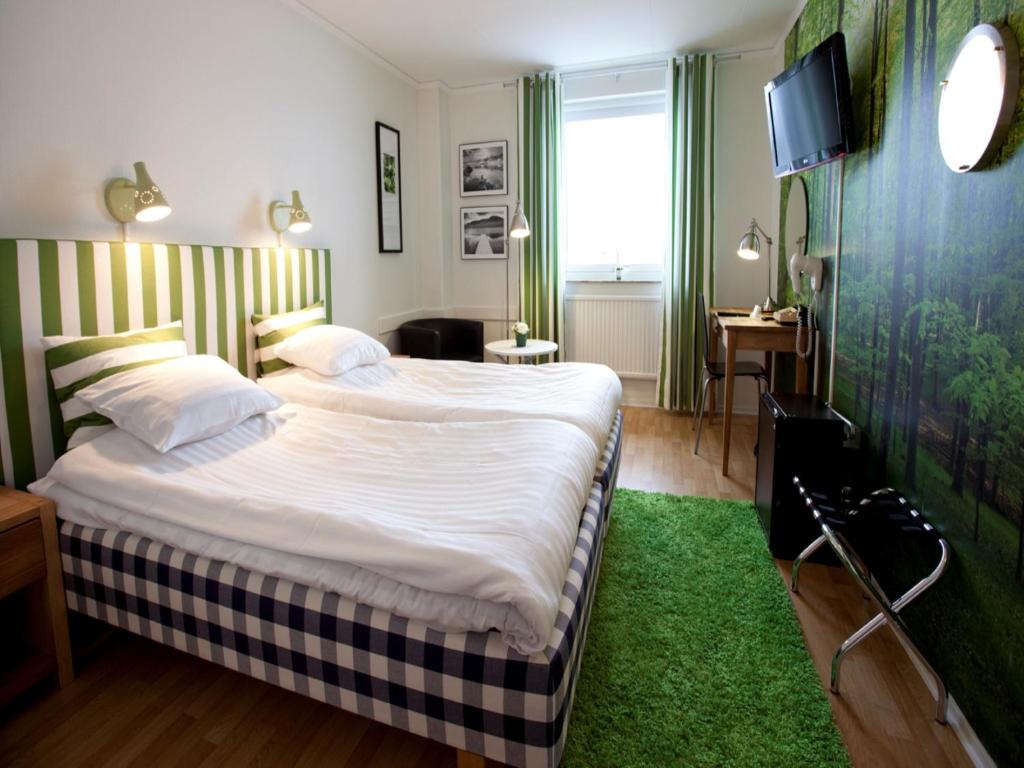 Postel nebo postele na pokoji v ubytování Lages Motel