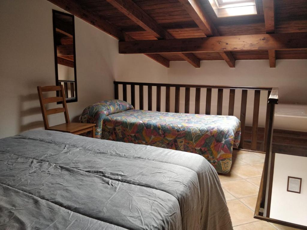 Posteľ alebo postele v izbe v ubytovaní Agriturismo Fratelli Mizzon