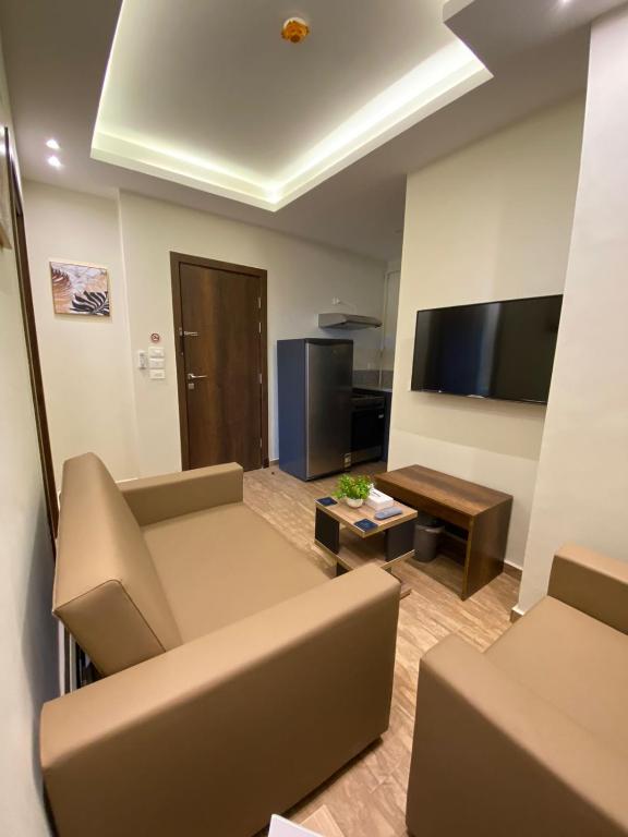 TV a/nebo společenská místnost v ubytování Royal Inn Residence New Cairo