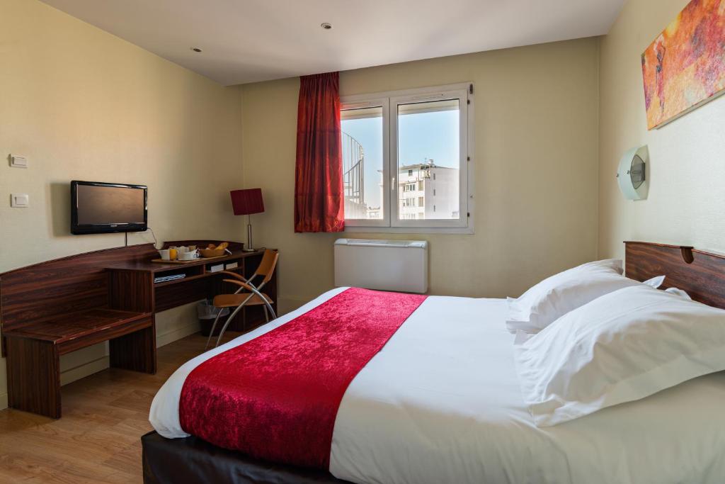 Postel nebo postele na pokoji v ubytování Hôtel Icare
