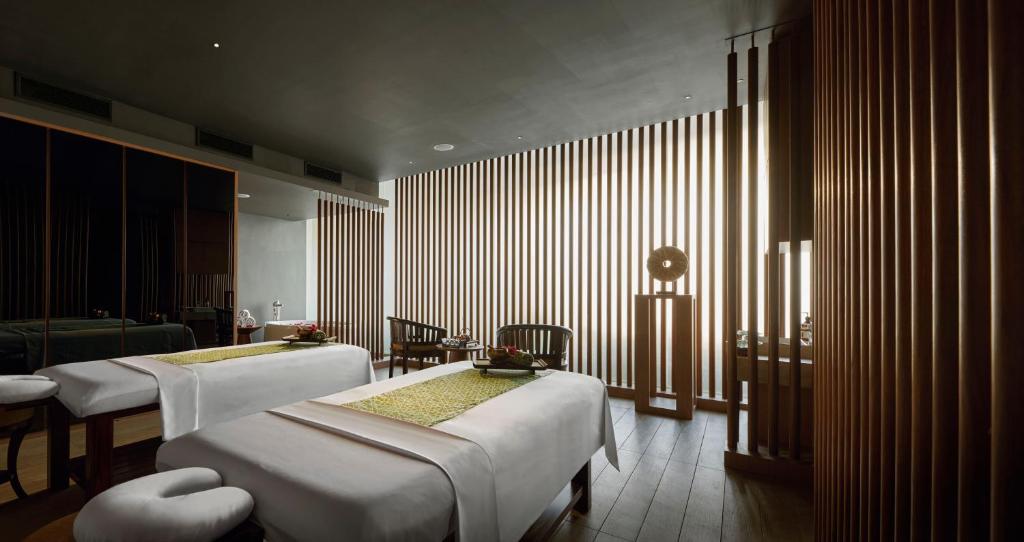 Postel nebo postele na pokoji v ubytování PARKROYAL Langkawi Resort
