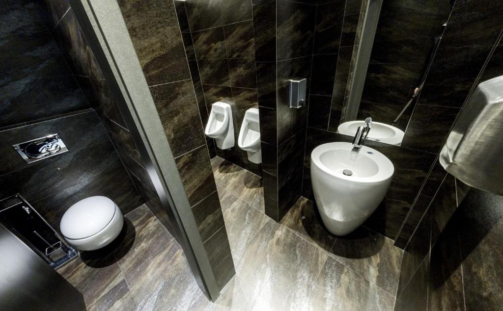Koupelna v ubytování Hotel Herrmes