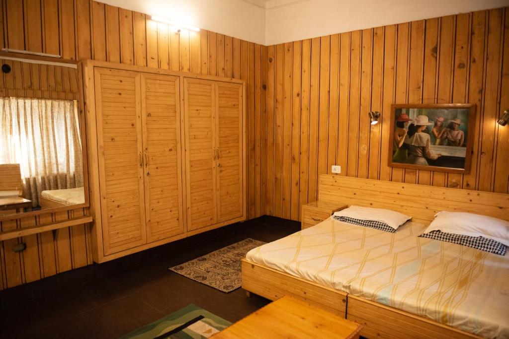 Postel nebo postele na pokoji v ubytování SETHI's HOMESTAY