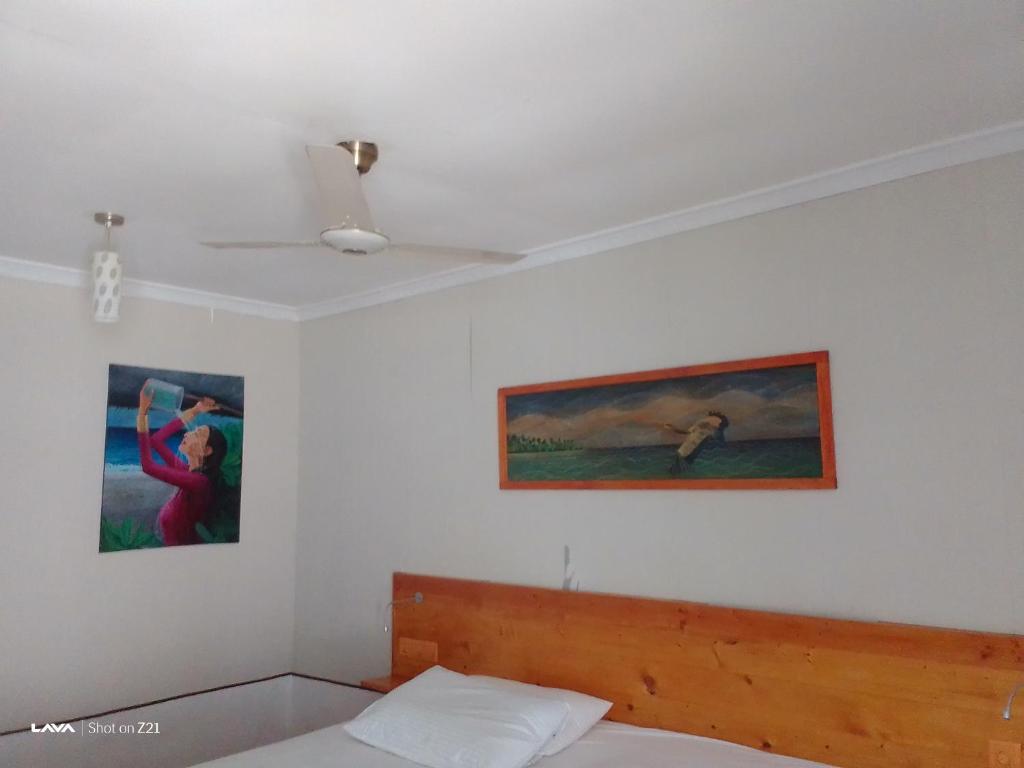 Postel nebo postele na pokoji v ubytování Ocean Way Guraidhoo
