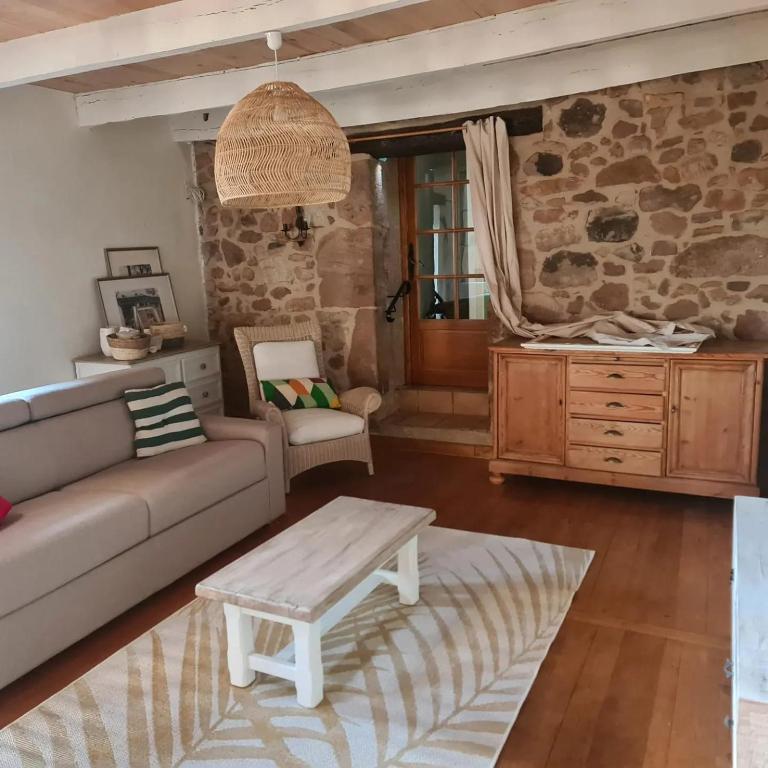 Posezení v ubytování Gîte du Ligal