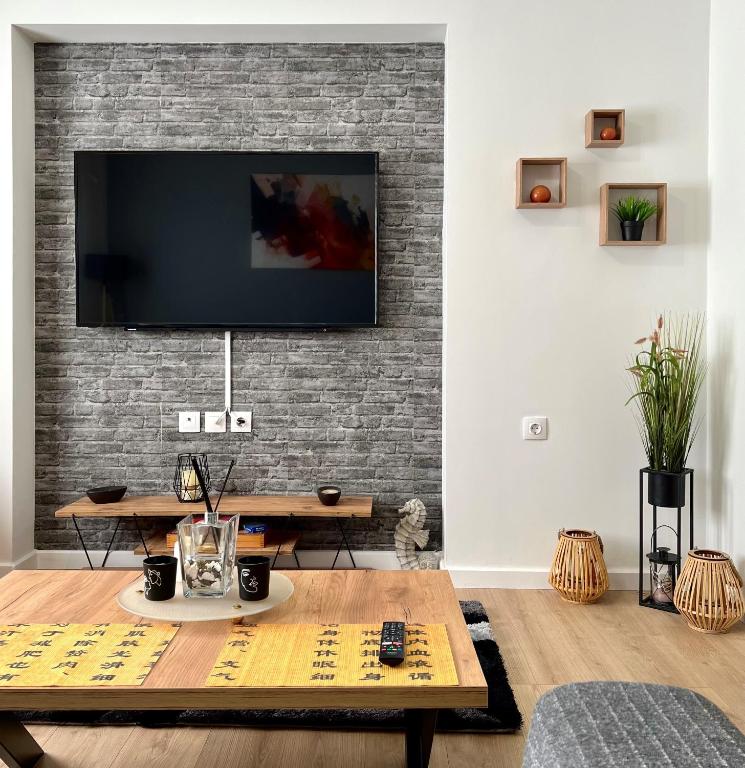 TV a/nebo společenská místnost v ubytování Seaside Casa