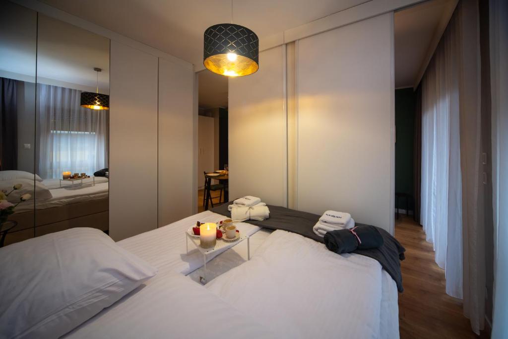 Posteľ alebo postele v izbe v ubytovaní Maya's Flats & Resorts 16 - NADMOTLAWIE