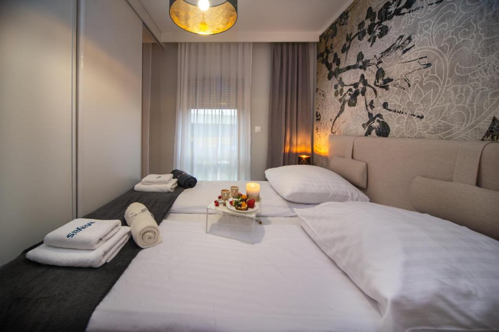 Posteľ alebo postele v izbe v ubytovaní Maya's Flats & Resorts 16 - NADMOTLAWIE