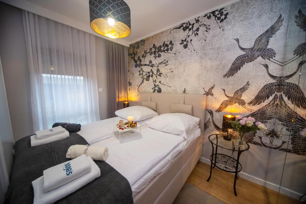 Posteľ alebo postele v izbe v ubytovaní Maya's Flats & Resorts 16 - NADMOTLAWIE