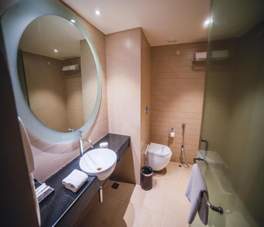 Koupelna v ubytování Barsana Hotel & Resort Siliguri