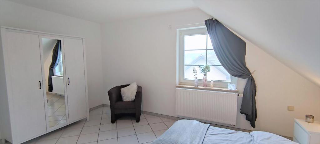 Postel nebo postele na pokoji v ubytování Ferienwohnung Rhöner WeitBlick