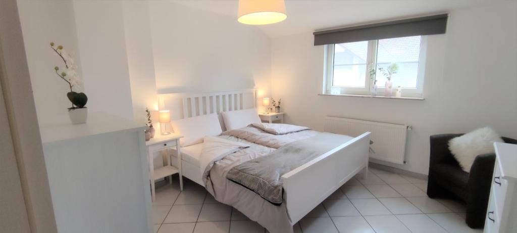 Postel nebo postele na pokoji v ubytování Ferienwohnung Rhöner WeitBlick