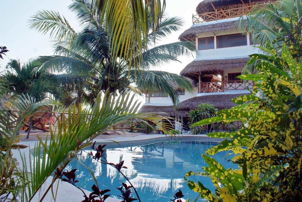 Bazén v ubytování Ensueño Holbox & Beach Club nebo v jeho okolí