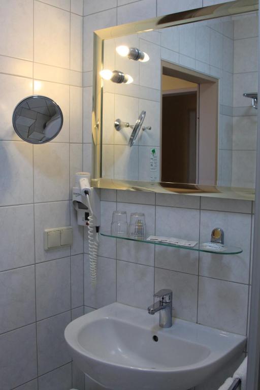 Koupelna v ubytování Hotel Harlesiel