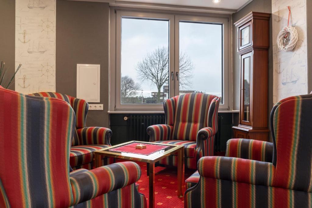 Posezení v ubytování Hotel Harlesiel