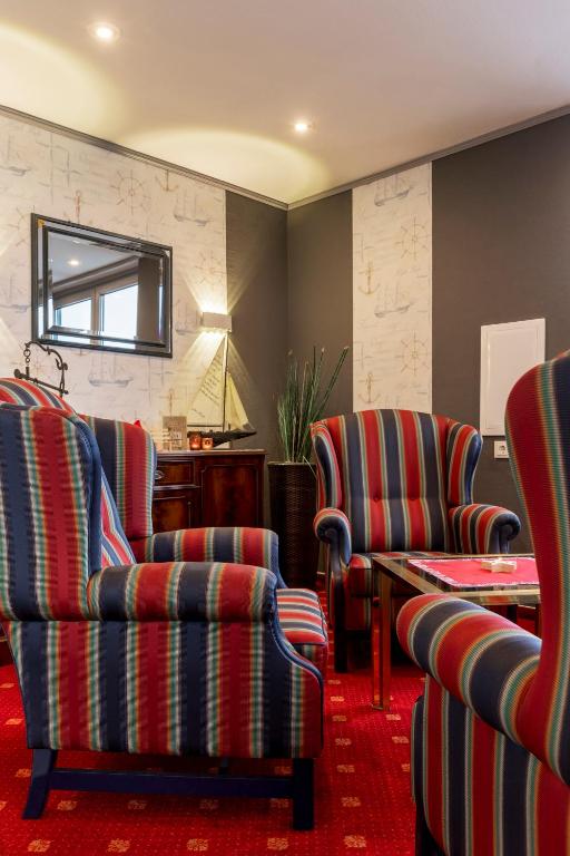 Posezení v ubytování Hotel Harlesiel