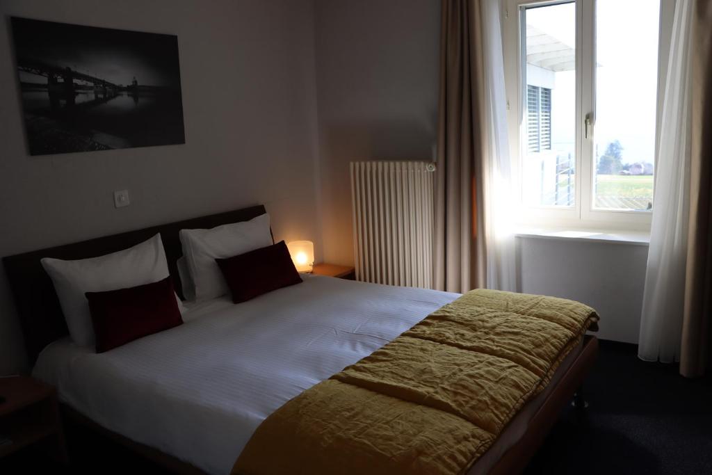 Voodi või voodid majutusasutuse La Clef D'Or Auberge Communale toas