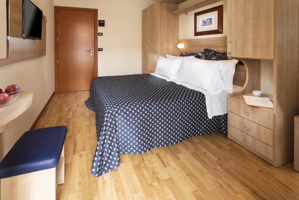 Postel nebo postele na pokoji v ubytování Hotel Baltic