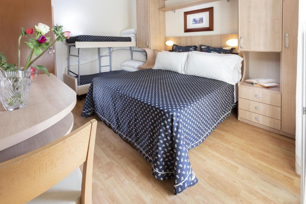 Postel nebo postele na pokoji v ubytování Hotel Baltic