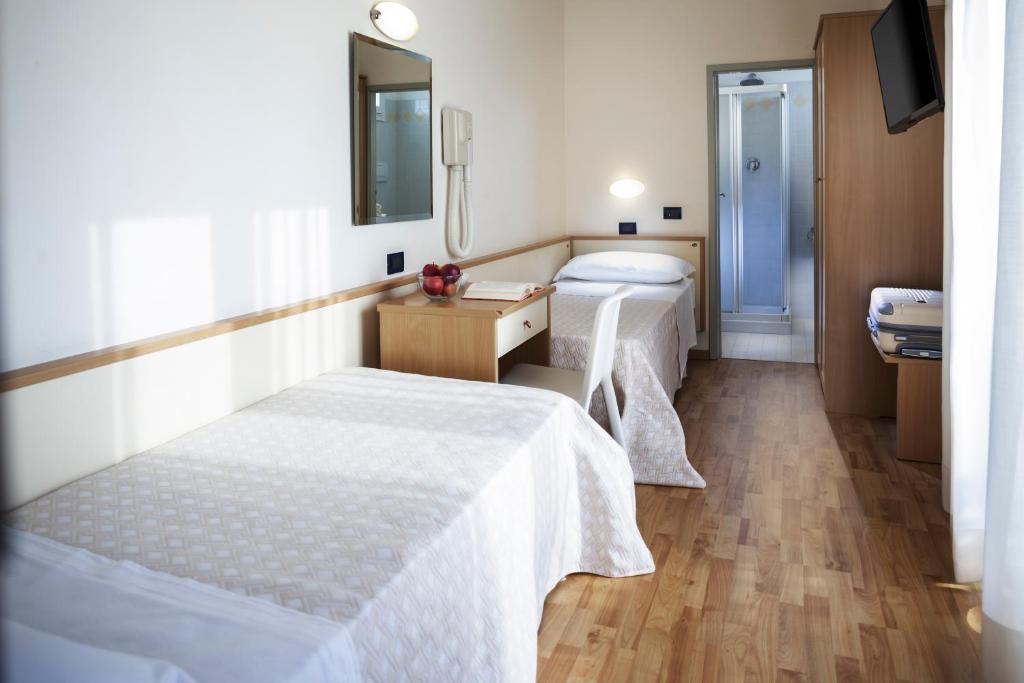 Postel nebo postele na pokoji v ubytování Hotel Baltic