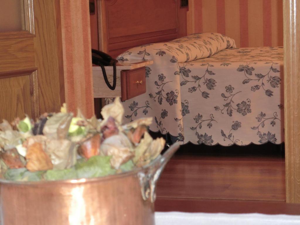 Postel nebo postele na pokoji v ubytování Hotel Las Ruedas