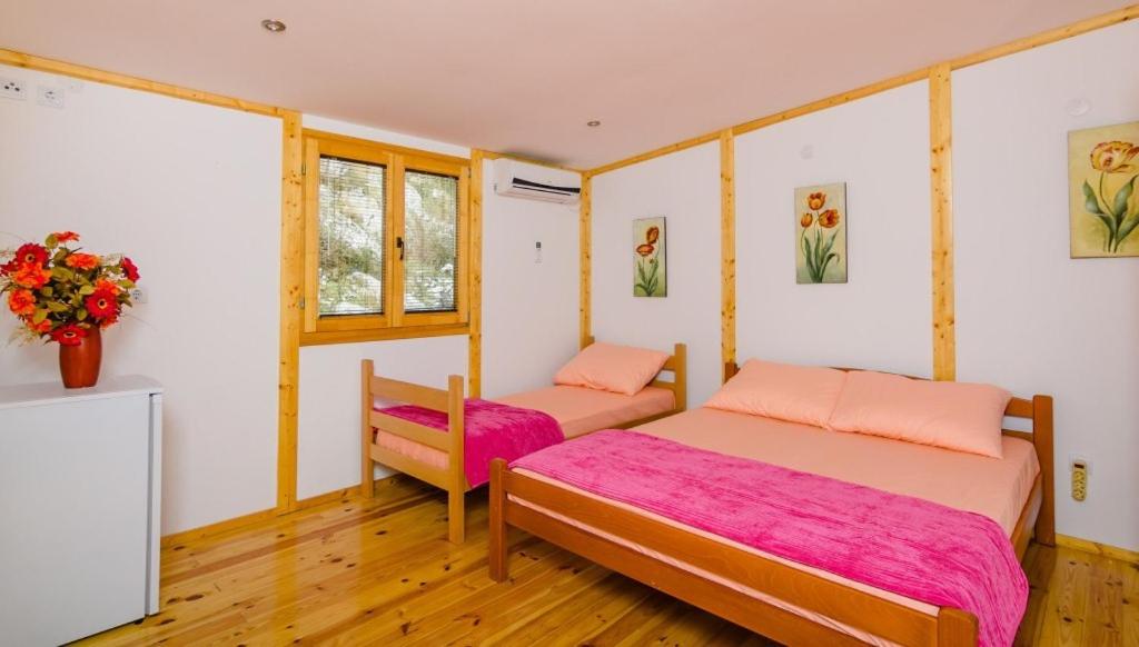 Ένα ή περισσότερα κρεβάτια σε δωμάτιο στο Villa Strp