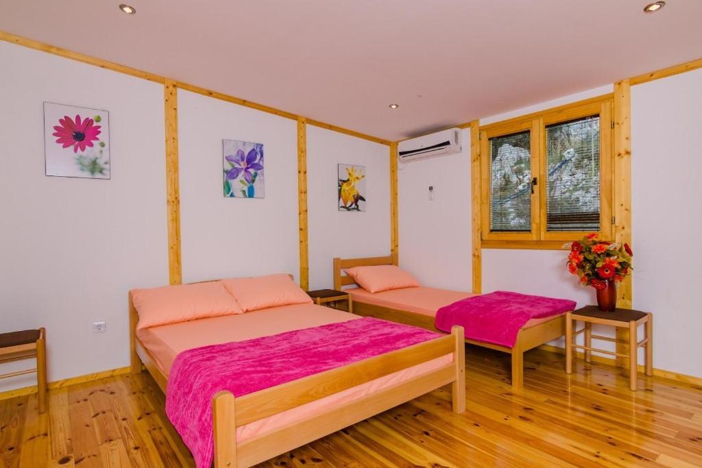 Ένα ή περισσότερα κρεβάτια σε δωμάτιο στο Villa Strp