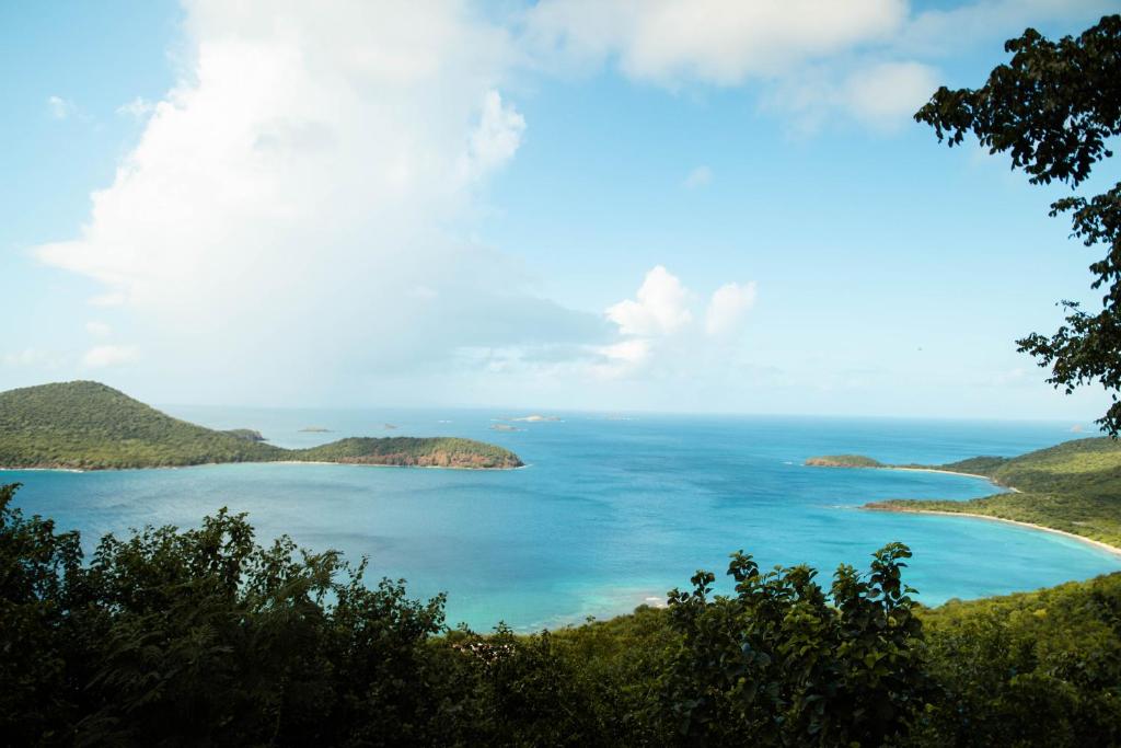 a view of two islands in the ocean at Aleli Cottages in Culebra