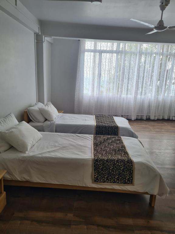 Postel nebo postele na pokoji v ubytování Bedz