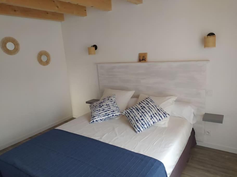 Posteľ alebo postele v izbe v ubytovaní Le Petit Pied à Terre du Luberon