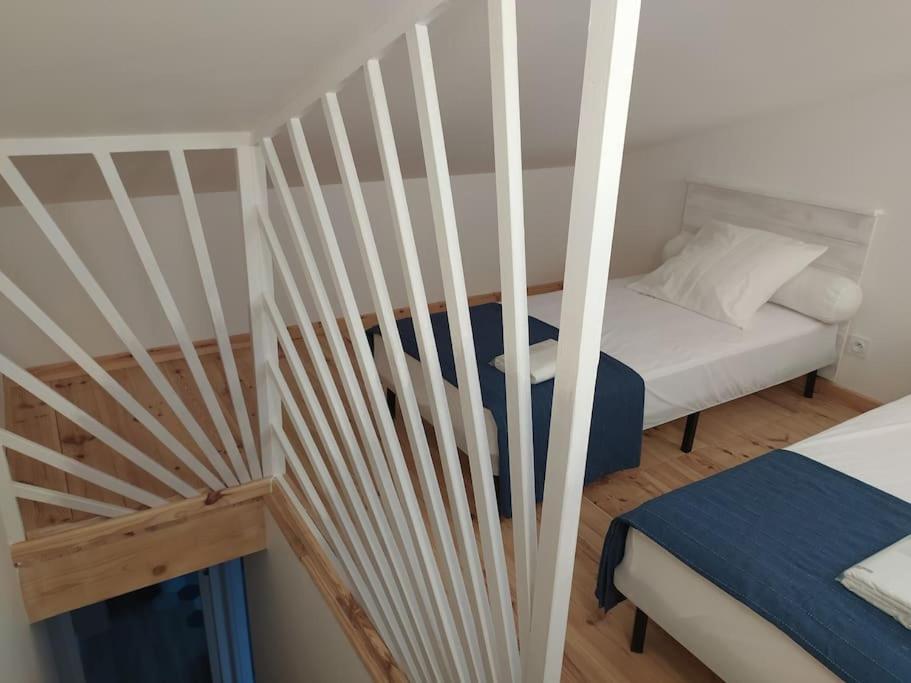 Posteľ alebo postele v izbe v ubytovaní Le Petit Pied à Terre du Luberon