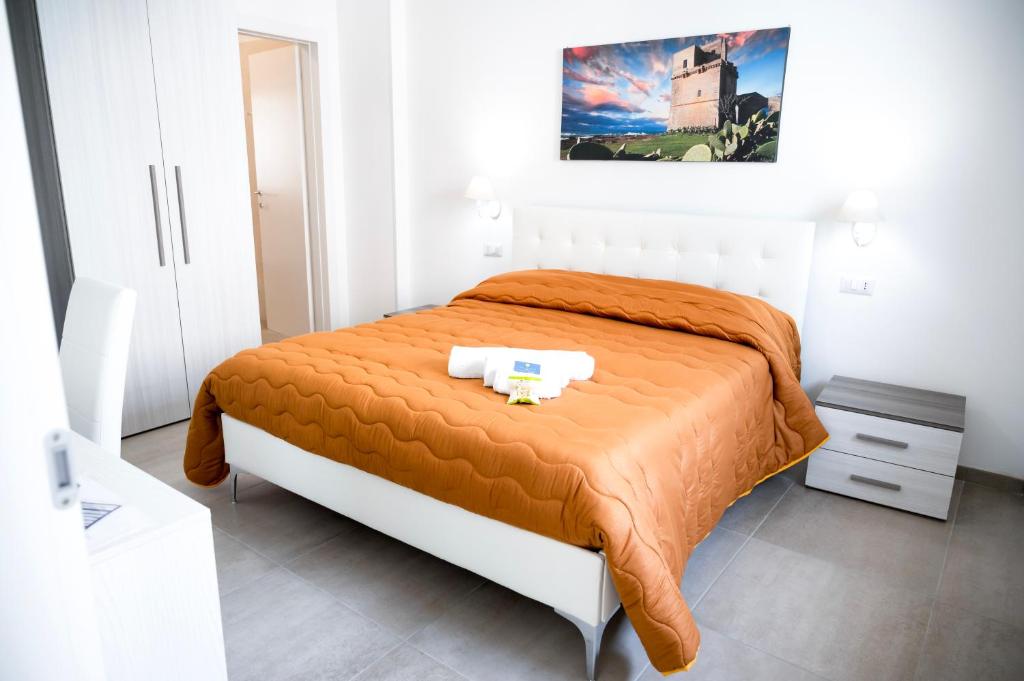 Postel nebo postele na pokoji v ubytování Bed and Breakfest Terra d'Arneo