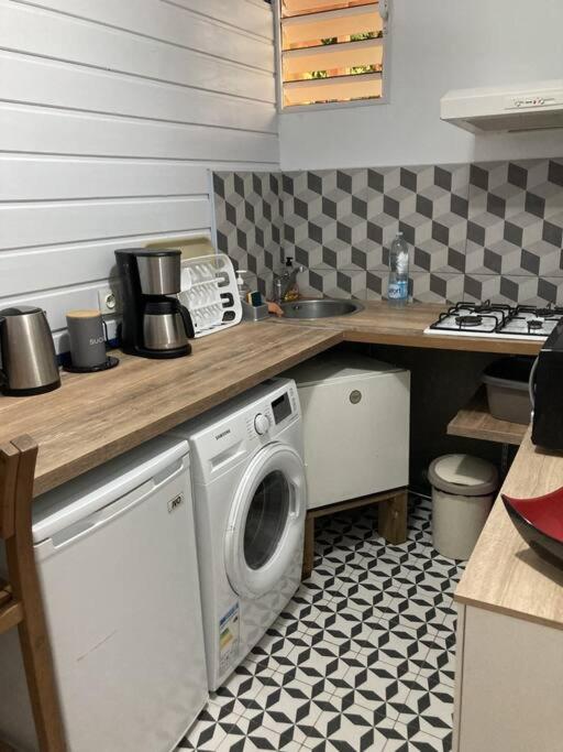 Kuchyň nebo kuchyňský kout v ubytování Agréable logement, bien situé