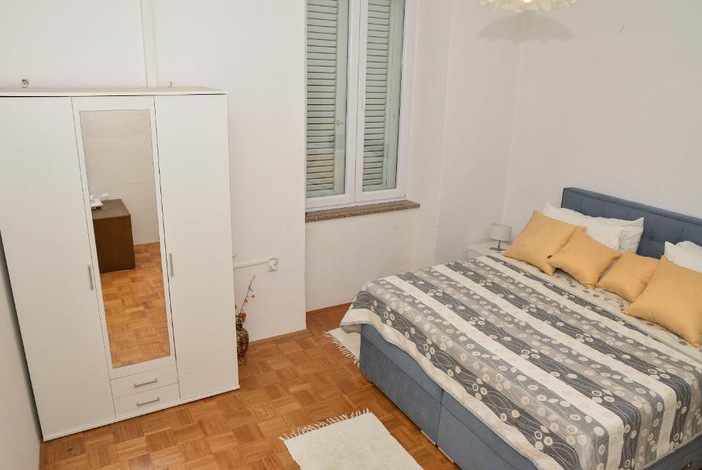 Posteľ alebo postele v izbe v ubytovaní Apartment Škunca